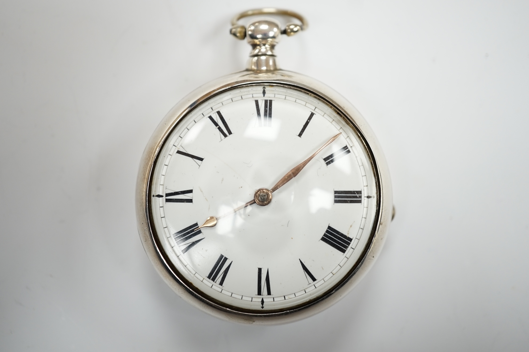 A George III silver pair cased keywind verge pocket watch, by W, Atwood of Lewes, with Roman dial and signed movement numbered 4644, outer case diameter 56mm.